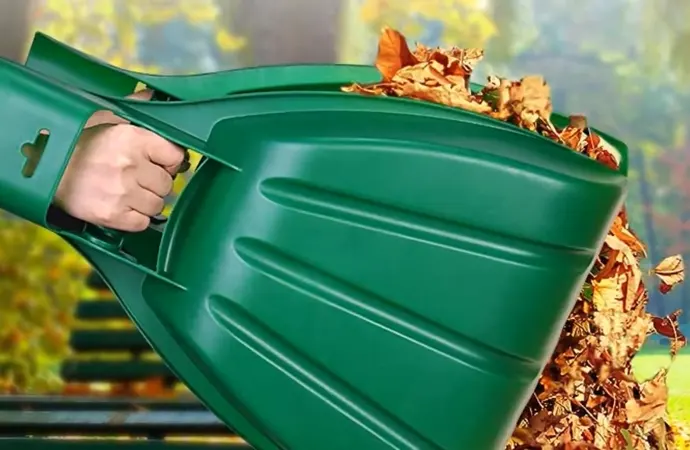 A leaf grabber is a flexible design that features two scoops to lift the leaf litter.
