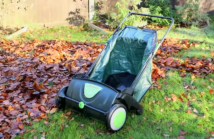 A leaf sweeper is a mechanical garden tool that sucks dry grass clippings and leaves.